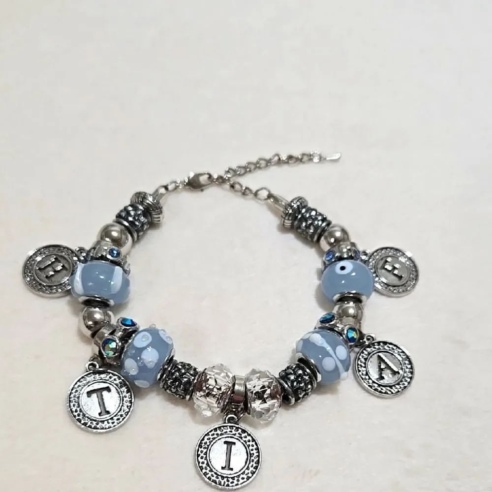 Silver and Blue Faith Charm Bracelet